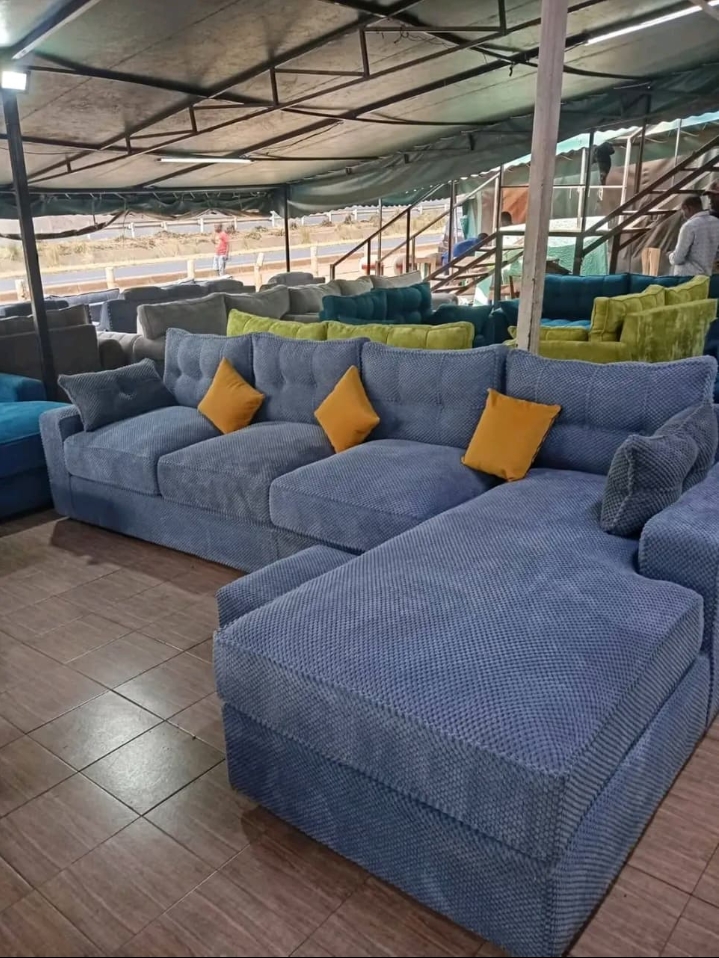 Modern Blue-Grey Sectional Sofa with Yellow Pillows